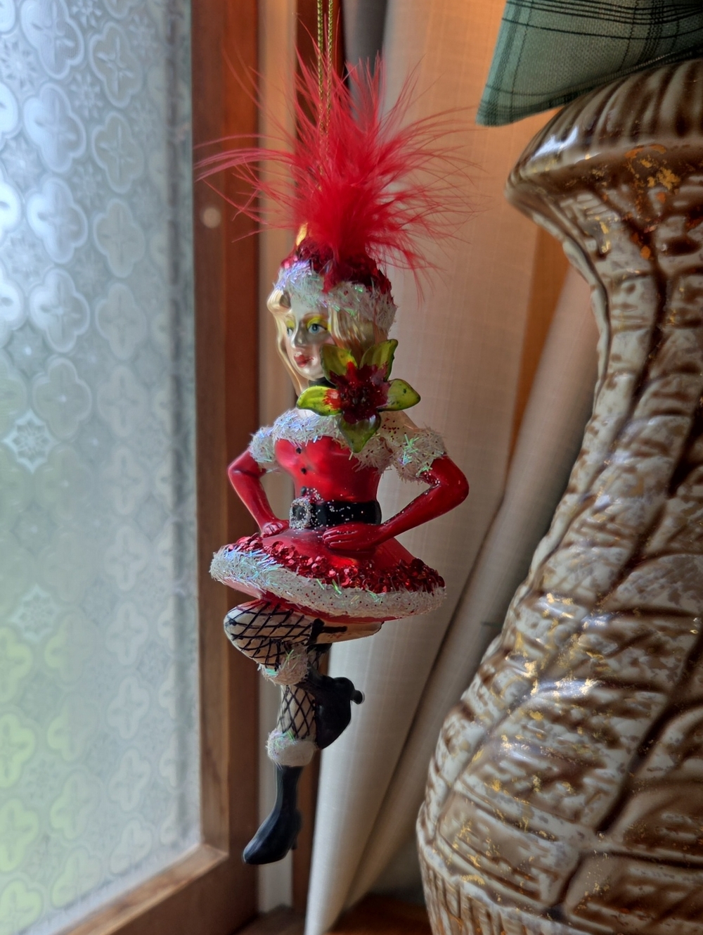 Woman in Santa Dress Dancing Glass Christmas Ornament